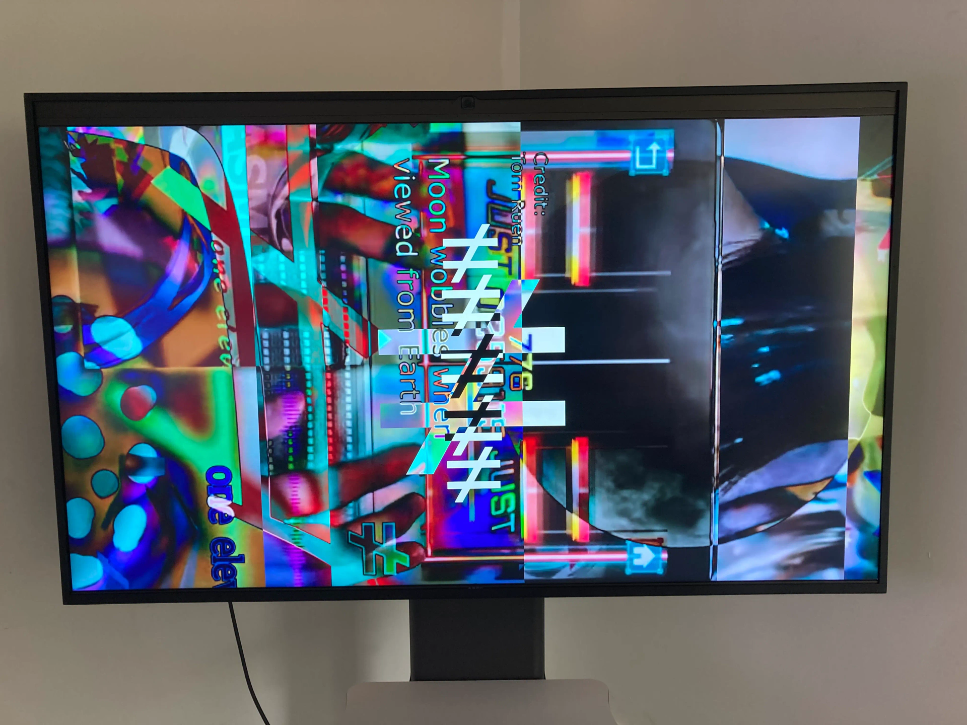 ≠ (Nonequality): gallery monitor displaying layered cyan and red imagery. Artwork by Jeanyoon Choi.